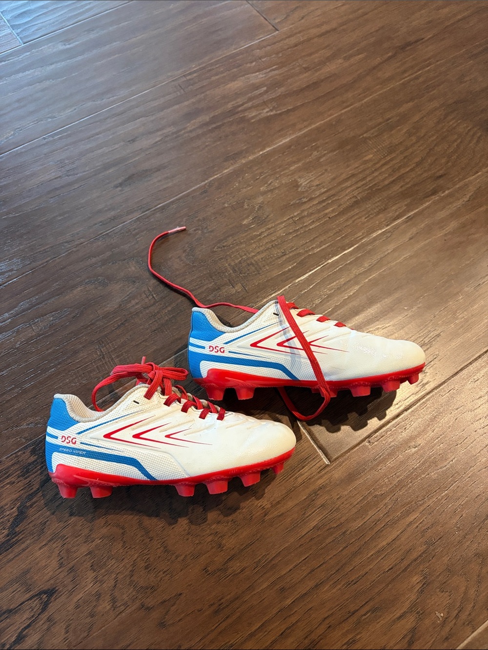 DSG Kids White, Red, and Blue Soccer Cleats